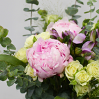 pink peony with eucalyptus, rose sprays packed for a flower subscription box from a fresh flower wholesaler 